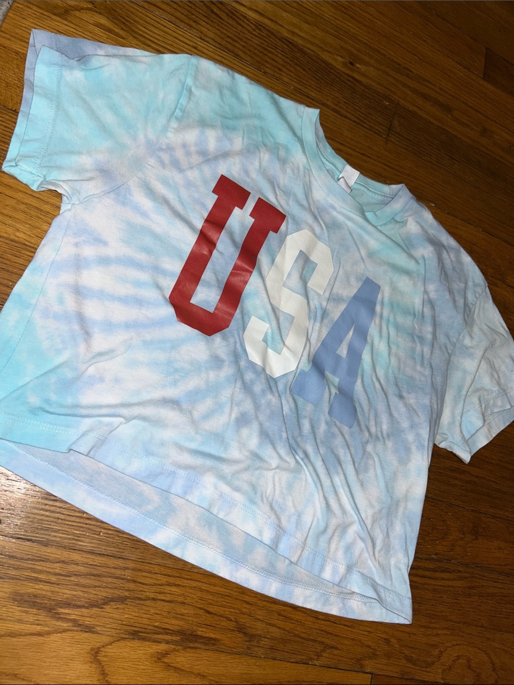 Boutique Light Blue Tie-Dye USA Crop Tee with Red, White, Blue Letters